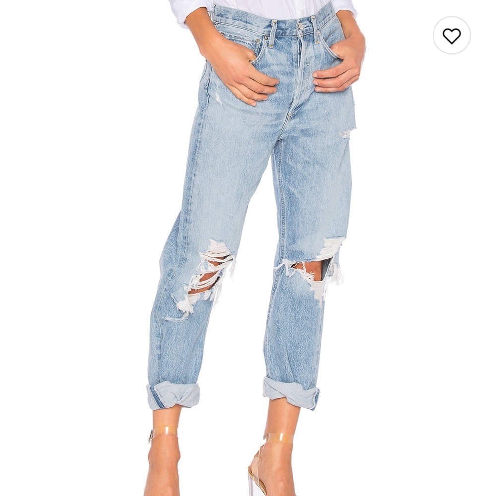 AGOLDE jeans. Size: 24 but fit like 23. Mid waisted. Straight leg with rips.